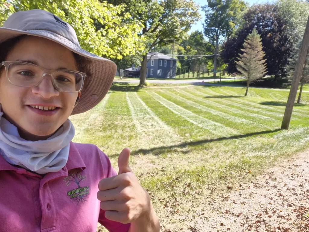 Picture of Owner with beautiful striped grass in background in Hudson, Mi