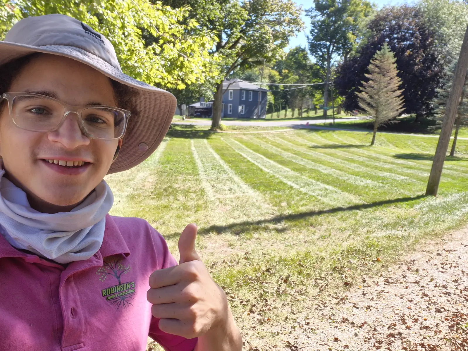 Picture of Owner with beautiful striped grass in background in Hudson, Mi